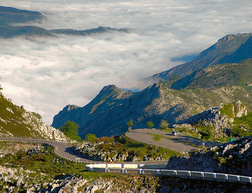 Mountain road zig-zag with fog in the valley