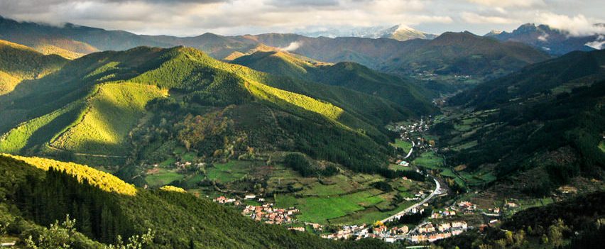 White mountains, green valleys and a small village