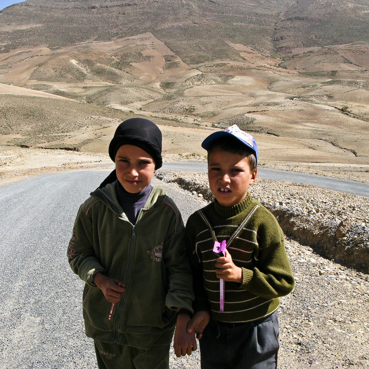 Two kids posing in front of the camera